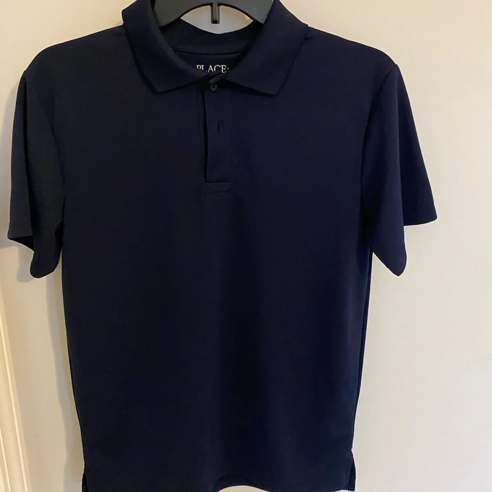 Boys navy blue uniform polo. 100% polyester. - Picture 3 of 4